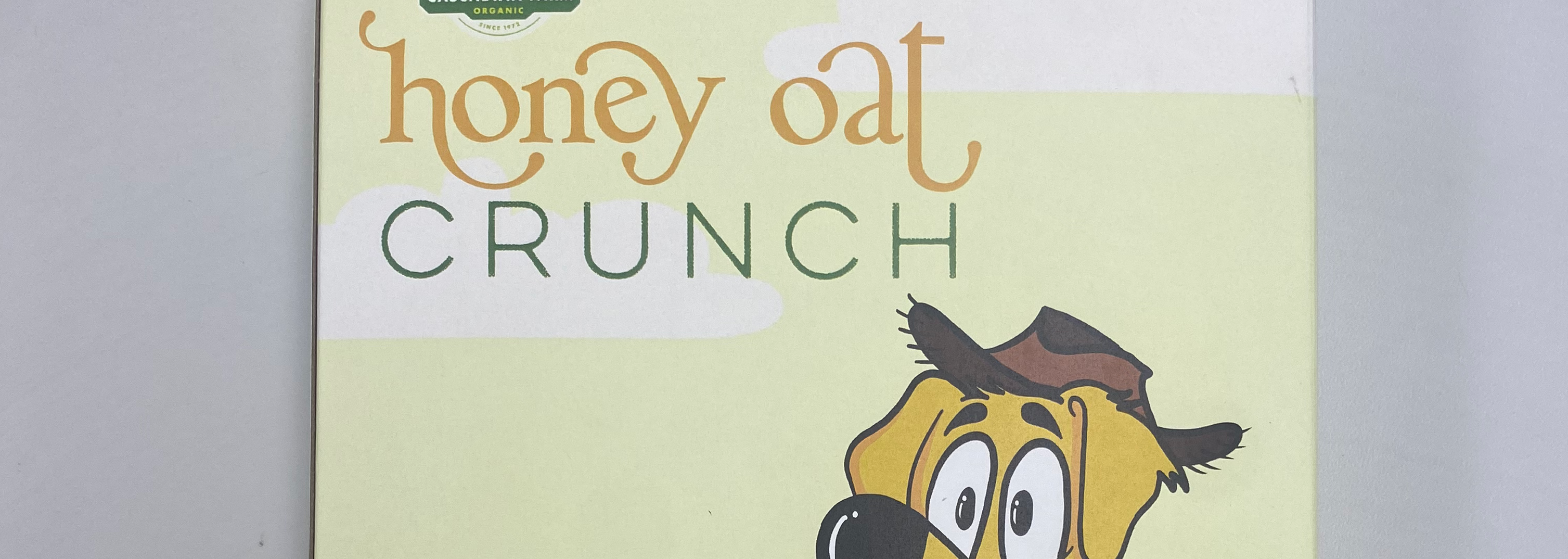 zoomed in shot of the honey crunch on the front of the cereal box